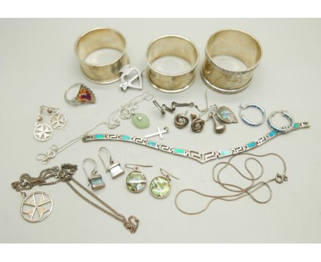Three silver napkin rings, a silver Maltese Cross pendant with matching earrings, two silver chains, silver Scottish sweethea