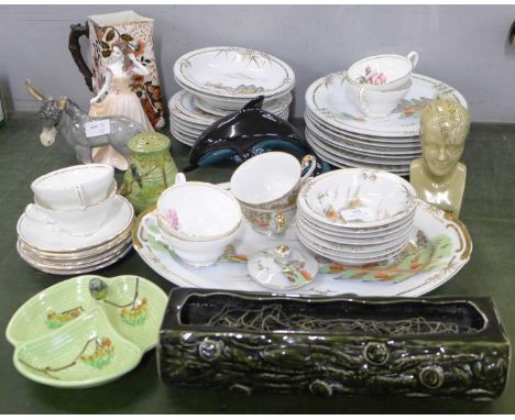 A Coalport figure, a Wedgwood donkey, a Poole pottery dolphin, a phrenology head, Dartmouth posy vase, part tea set and a Jap