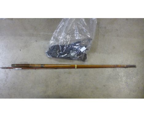 Three vintage fishing reels, net and fishing rod 