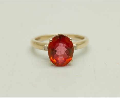A 9ct gold, red topaz and diamond ring, 2.5g, N 