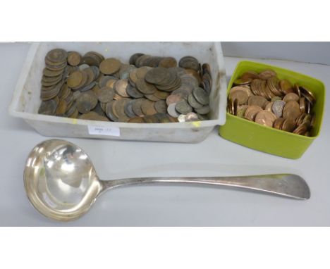 A collection of British and foreign coins, together with a silver plated Walker and Hall ladle 