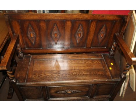 AN OAK MONKS BENCH 
