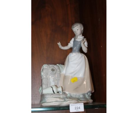 A NAO FIGURE OF A WATER CARRIER 