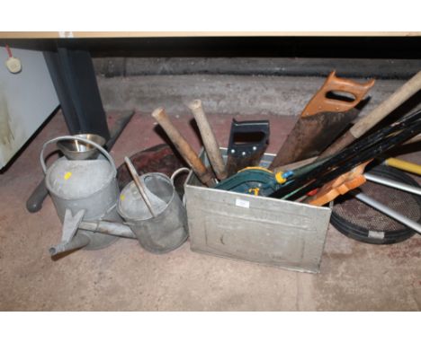 A QUANTITY OF TOOLS WATERING CANS ETC