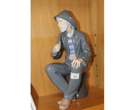 A LARGE NAO FIGURE OF A FISHERMAN 