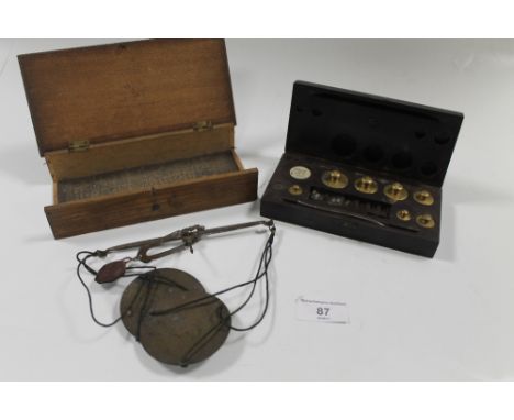 A SET OF GEORGIAN SCALES TOGETHER WITH A SET OF WEIGHTS IN BAKELITE CASE