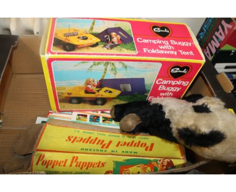 A CHILTON PANDA BEAR (LABEL WORN), together with a Sindy buggy and fold away tent in original box, a boxed poppet puppet and 