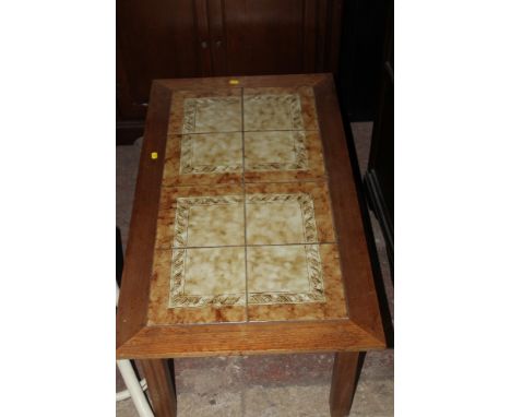 A TILE TOP TABLE AND A COAT STAND