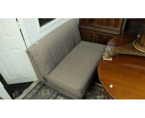 An upholstered sofa bed