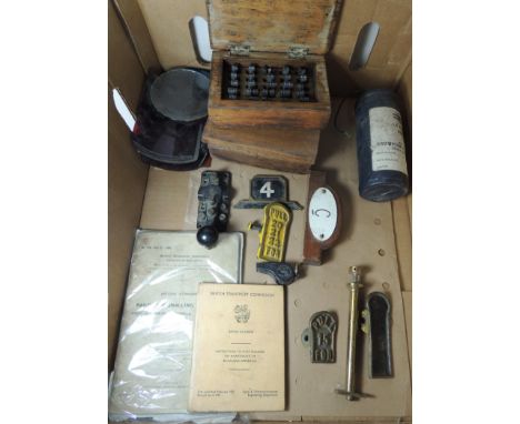 A morse code key; some signal lever plates; signalling booklets (BR); two woode boxes containing printing blocks; glass hand 