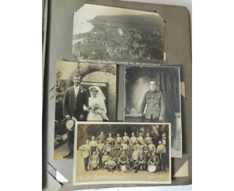An album of approx 80 assorted postcards, includes a selection of rp portrait postcards of military interest; "Hut 74 Grenadi