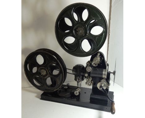 A Butcher Houghton Empire Projector, c.1920's, hand cranked 35mm silent projector, complete including handle; together with 2