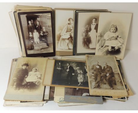 A quantity of Victorian cabinet size photo portrait cards of children, couples, family groups; photographers include Vandyk, 