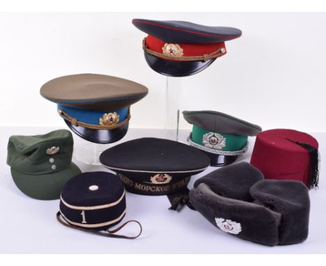 Selection of Military Headdress, including a Soviet Russian Air Force Officers peak cap with blue band and cap badge to centr