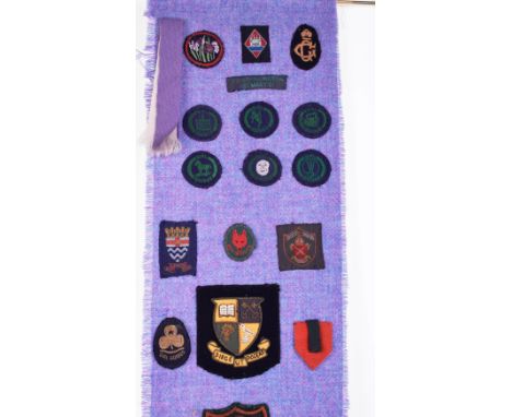 A selection of boy scouts and girl guides badges consisting of both cloth, enamel and buttoned style badges including seventh