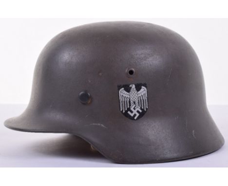 World War Two German Army Steel Combat Helmet, being a refurbished example with replaced German army decal to one side, green