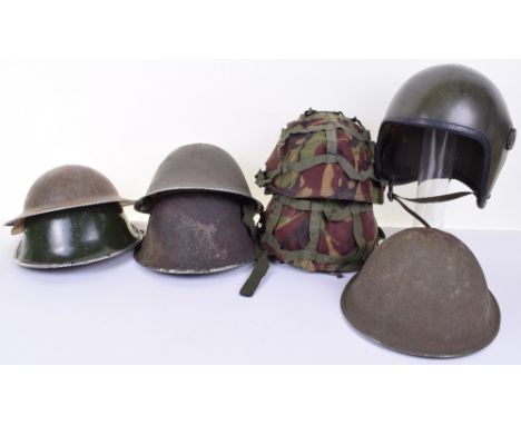 Selection of Military Helmets, consisting of WW2 South African issue steel helmet shell with remains of green paint finish, 2