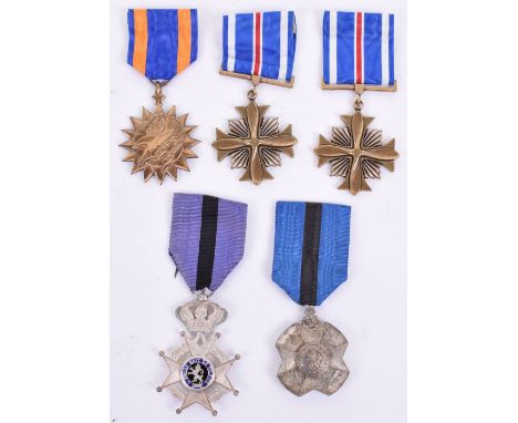 Belgium Order of the Leopold II Knight Medal, in silvered metal with black and blue enamel centre. Complete with ribbon. Acco