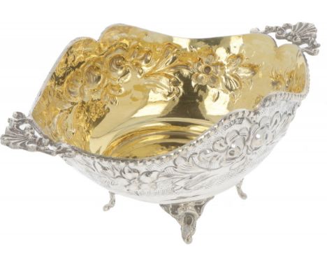 Cast model with embossed floral decorations and gilding on the inside. Indonesia?, 20th century, hallmarks: AD. 800. 135 gram