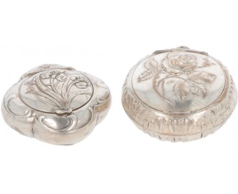 Adorned with embossed flowers, rocailles and floral decorations, including 1 pill / snuff box BWG. France, early 20th century
