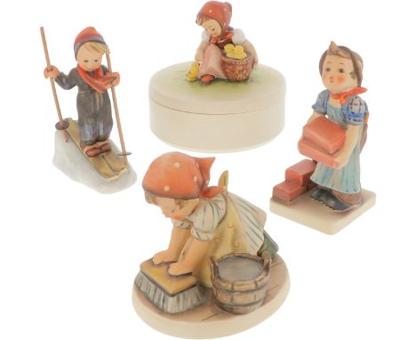 A.o. a brick layer, a little girl with chicks on a box, a skier and a housemaid. All marked: "Goebel" underneath. Various siz
