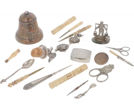 Consisting of various sewing tools, bell, scissors, cigar cutter, pill box, etc. 19th / 20th century, hallmarks: various hall