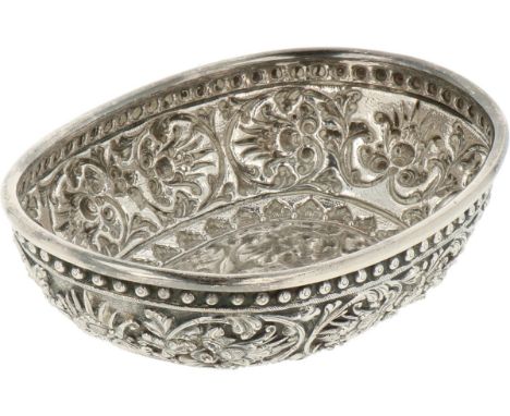 Oval model embellished with traditional repoussé motifs. Indonesia, 20th century, Marked: ZI - light traces of age and use. 1