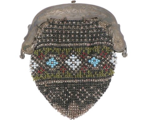 Bracket with engraved decoration and pouch adorned with glass beads. Netherlands, 1876, hallmarks: lion, Minerva, illegible m