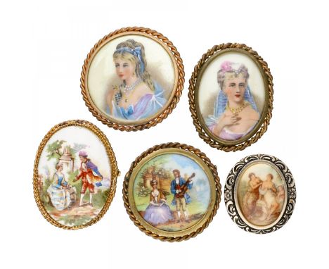 Five French Limoges painted porcelain brooches in gold-plated frame, two with a portrait of an elegant lady and two with a pa