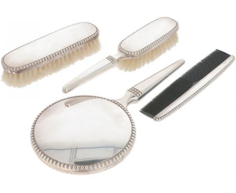 Consisting of a hand mirror, comb and 2 brushes. Germany, Schwäbisch Gmünd, Hermann Bauer, early 20th century, hallmarks: 925