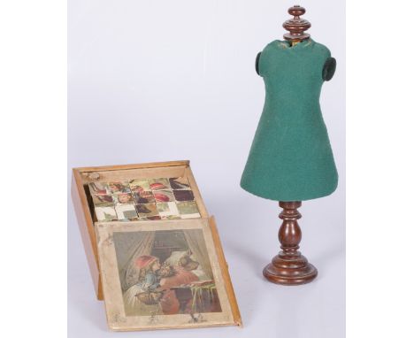 Together with a block puzzle depicting Little Red Riding Hood.H. mannequin: 46.5 cm. Various conditions. Estimate: € 10 - € 2