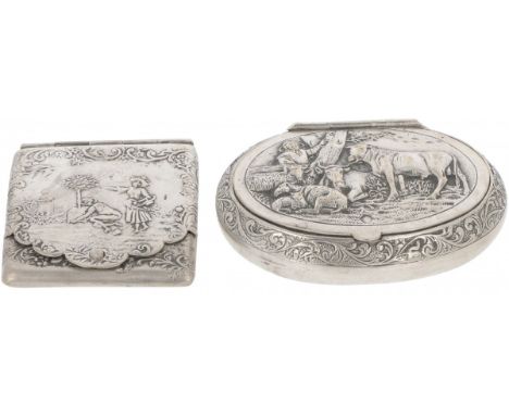 Consisting of a snuff box and a match case, both with embossed relief scenes. Netherlands, 20th century, hallmarks: Various h