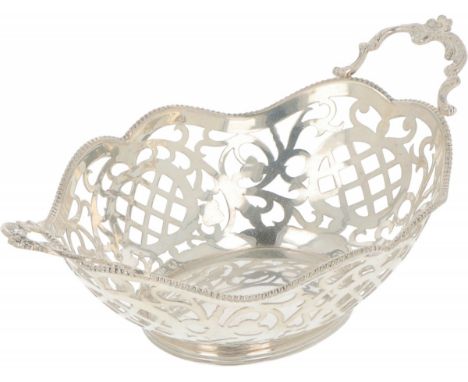 Oval model with openwork sides, soldered handles and pearl rim. The Netherlands, Schoonhoven, J. Krins, 1957, hallmarks: Leeu