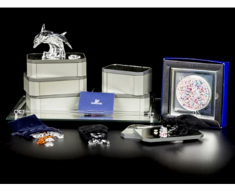 Consisting of: Various height trays with mirror, various mini crystals, a mirror tray (not Swarovski) with Swarovski annual i