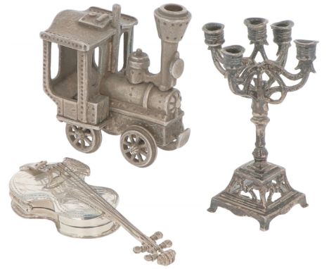 Consisting of a locomotive, candlestick and a violin. Netherlands, 20th century, hallmarks: Various hallmarks - signs of wear