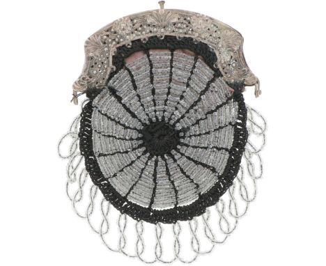 Beautiful openwork engraved bracket. The purse is crocheted with glass beads. The Netherlands, Schoonhoven, Johannes Leonardu