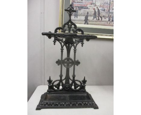 A Victorian black painted, cast iron Gothic revival stick stand 
