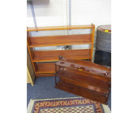 A stained pine bookcase and a Victorian mahogany wall shelf unit 