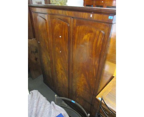 A Victorian mahogany three door wardrobe having fitted shelves and drawers, 75" h x 64"w 