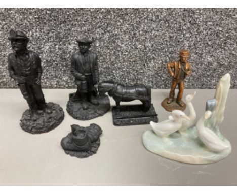 Four coal sculptures, Nao for Lladro geese group and a metal figure of a gentleman with inscription to base