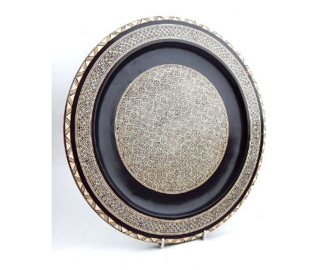 Syrian mother-of-pearl inlaid circular hardwood tray with geometric decoration, 34cm dia