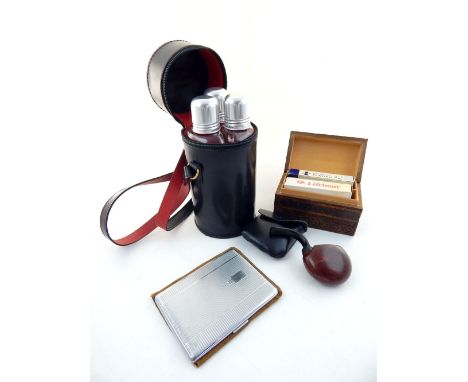 Three spirit flasks within a black leather travelling case, 21cm h, chrome cigarette case, folding pipe, carved hardwood play