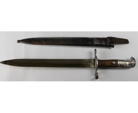 Bayonet: A Swiss Model 1889 Short Bayonet Ricasso marked 'ELSENER SCHWYZ'. In its steel scabbard. Surface rust to scabbard an