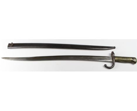 Bayonet: A French Model 1866 Sabre bayonet, in its steel scabbard. Light to medium pitting overall, clean blade. Sound overal