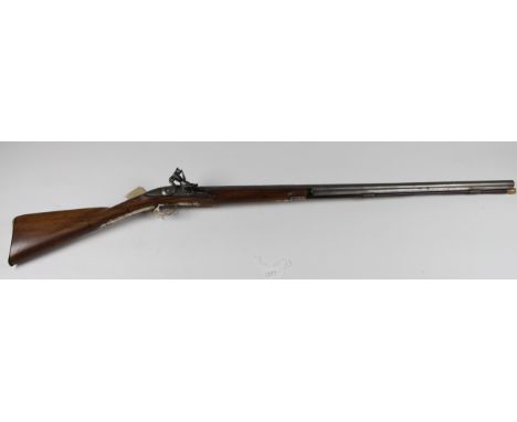 Shotgun: A good flintlock sporting shotgun by Sikes circa 1800. Walnut half-stock with silver buttplate and escutcheon with s