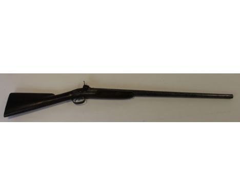 Shotgun: A 4 bore (approx) percussion S/B shotgun circa 1830. Barrel 31" approx. Large percussion hammer. Chequered walnut st