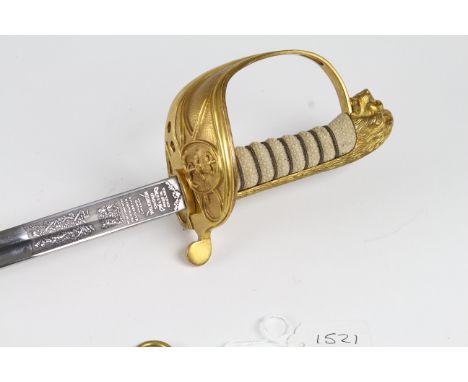 Sword: A good QE2, 1827 Pattern Naval Officers sword. Etched blade 31". Brass gilt hilt with folding catch. Sword numbered 96