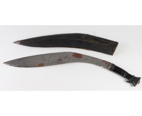 Kukri: A huge Kukri sword. Heavy traditional blade 23". One piece decorated wooden grip. In its wooden scabbard with leather 
