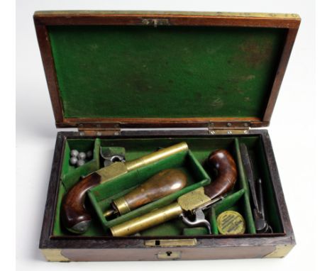 Pistols: A cased pair of percussion pocket pistols by Ketland. Brass frame signed 'KETLAND' & 'LONDON' with brass turn off ba