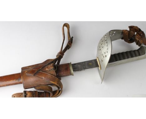 Sword: A Pattern 1897 Infantry Officers Sword. Guard with George V Crown & Cypher. Etched blade 32". Good wirebound, fishskin